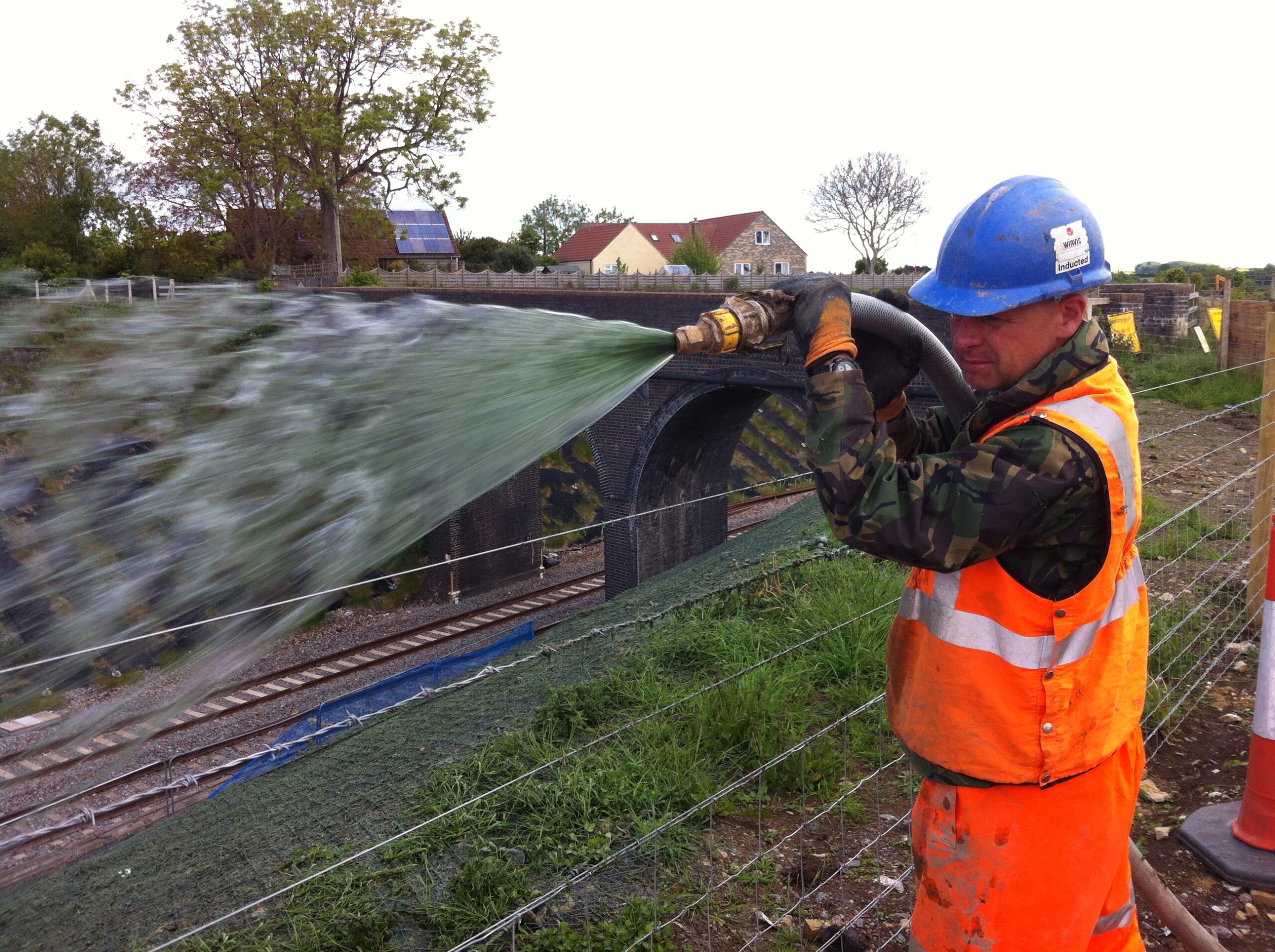 man watering Hydra CX
